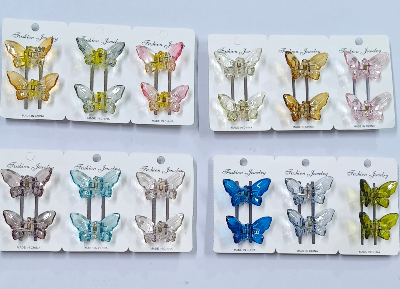 TRENDY BUTTERFLY HAIR CLAWS (24 PCS)